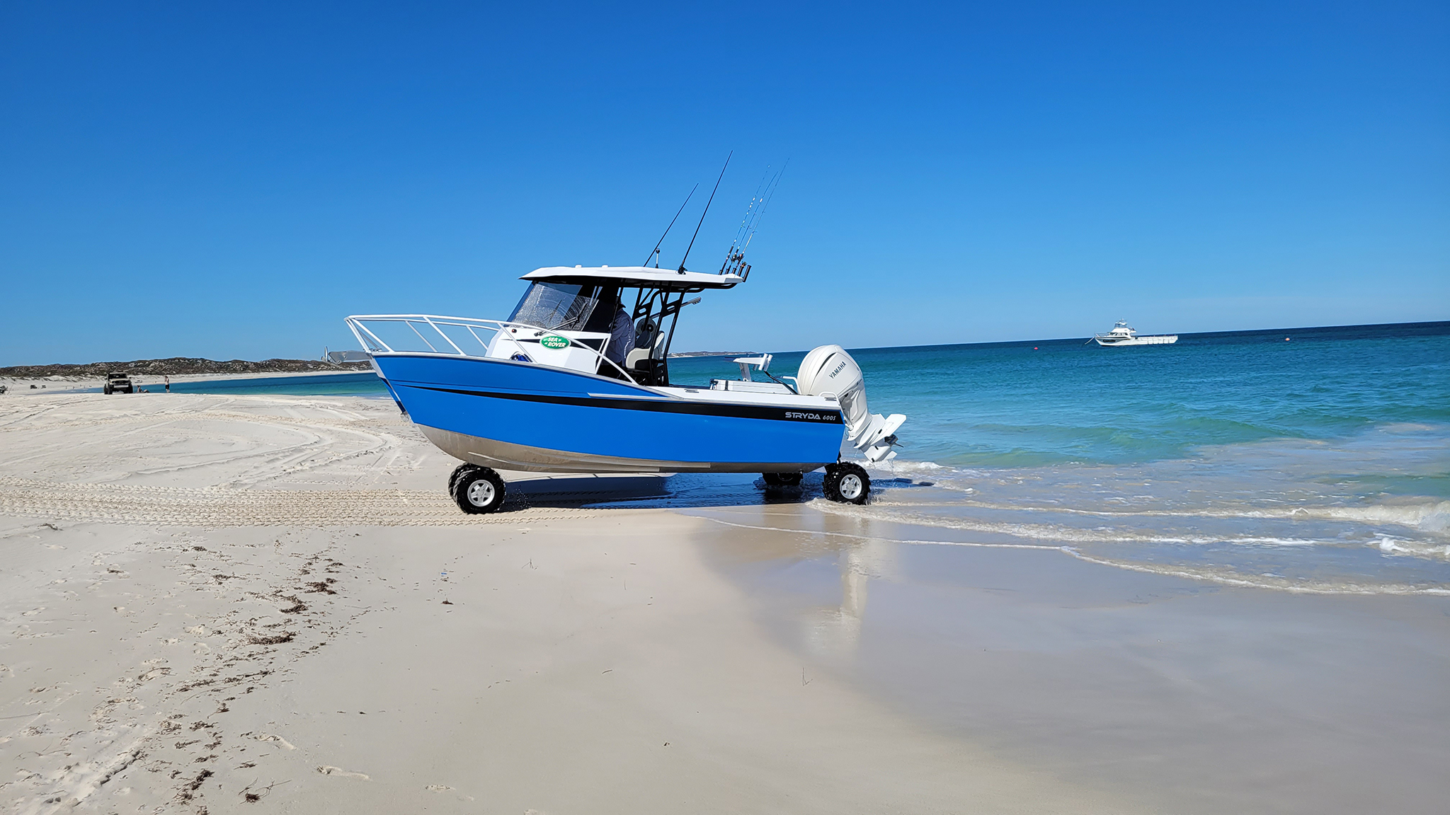 Amphibious catamaran Stryda 600s landing on beach